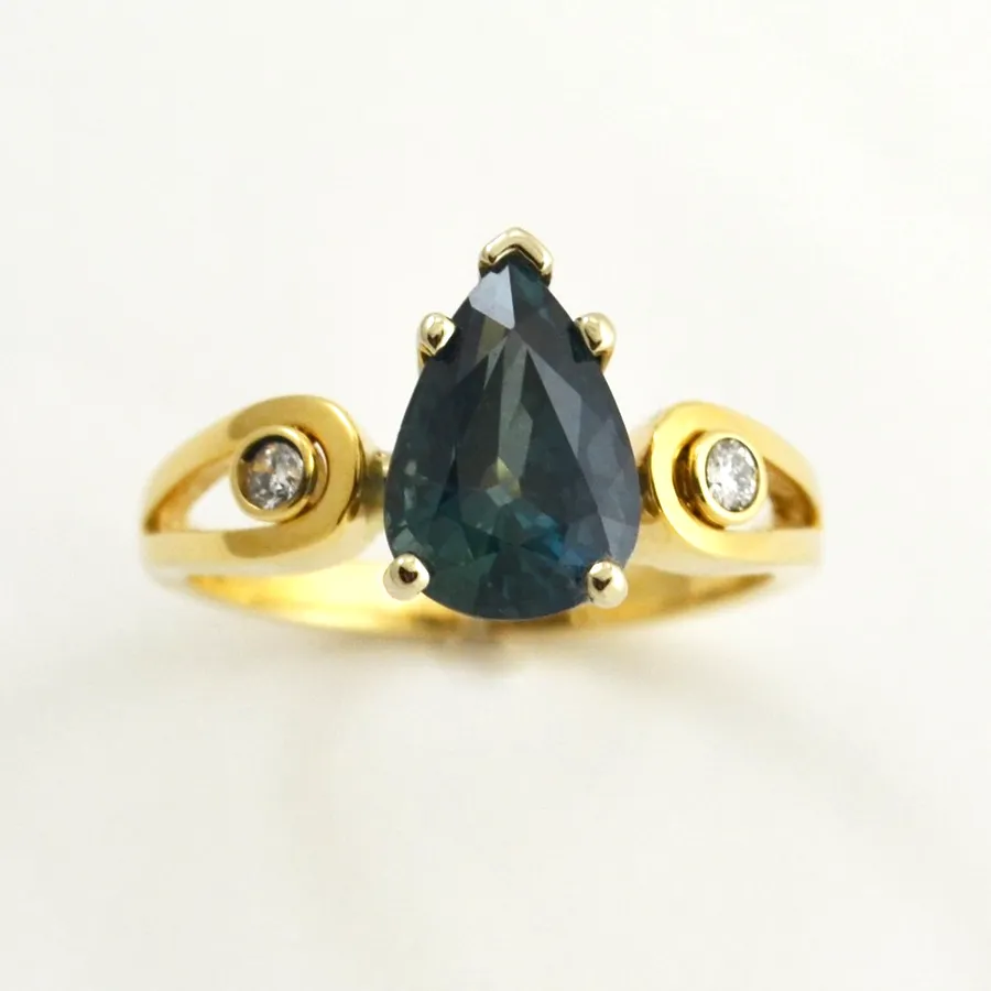 14k "Party" Sapphire 4.47 carat with Mixes of Tea & Blue in a perfect Pear Cut Ring, accented with Bezel set Diamond Accents by Sharon Teaman