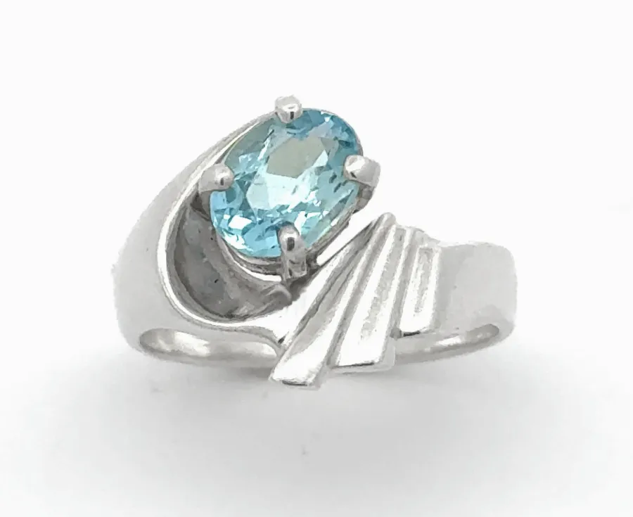 Aquamarine 1.10 Carat Oval Sterling Silver Ring Mounted in a 4 prong Sterling basket by Sharon Teaman