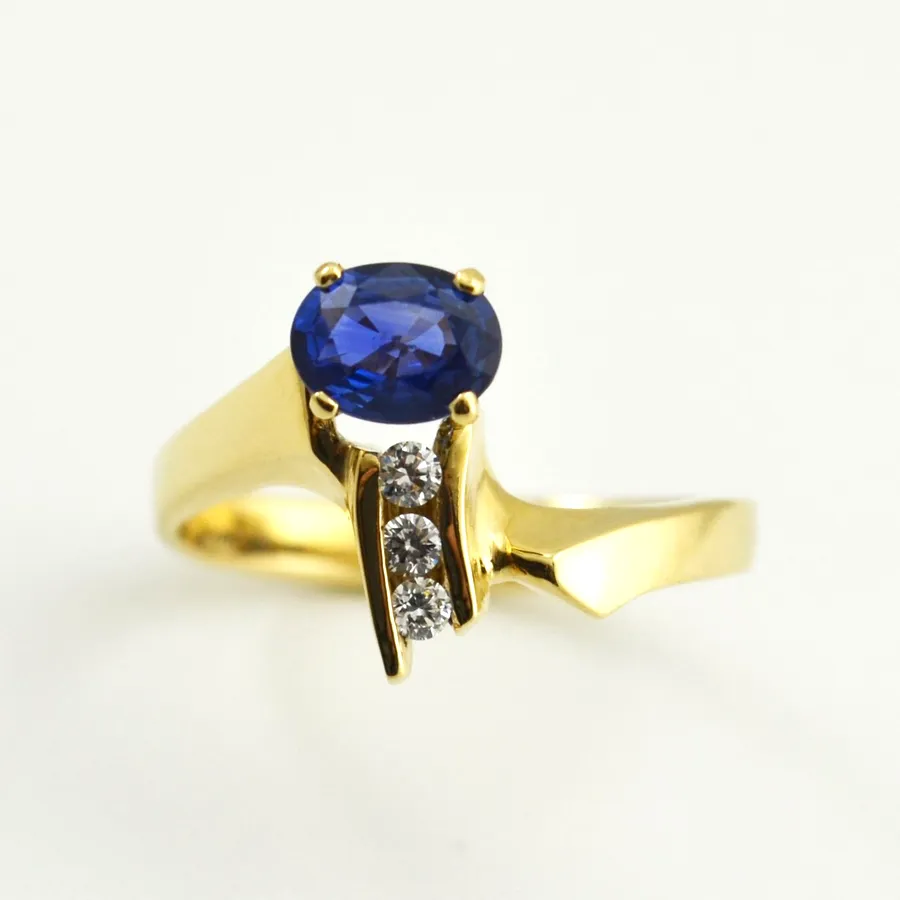 Ceylon Sapphire Ring Faceted Oval with "Perfect Ceylon Blue" Color accented with 3 channel set Diamonds (earth mined) by Sharon Teaman