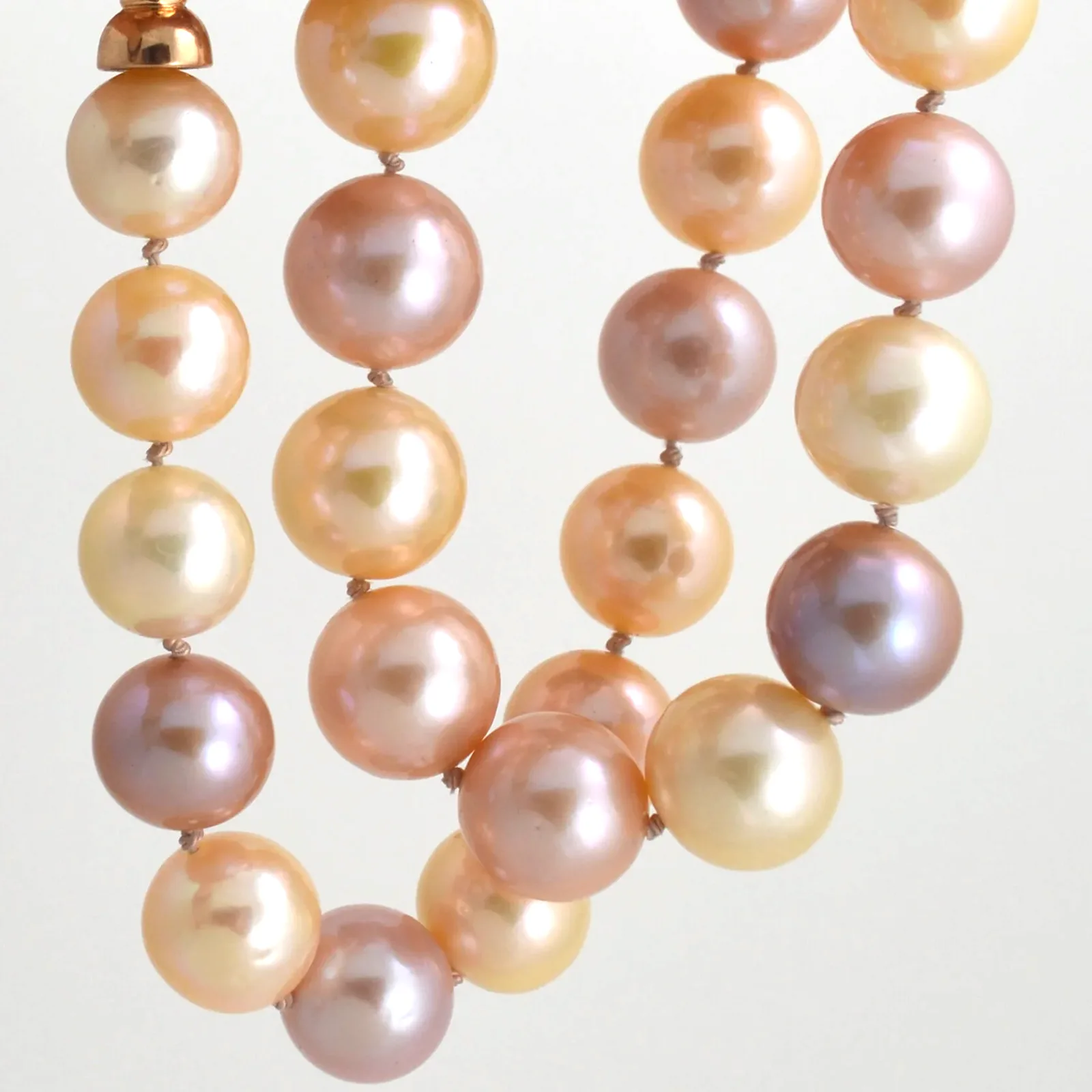 Fresh Water FINE Ming Pearls graduated from 15 to 12mm diameter in Natural Colors: Purplish/Pink, Pink, Peach, Blush colors by Sharon Teaman — view 1