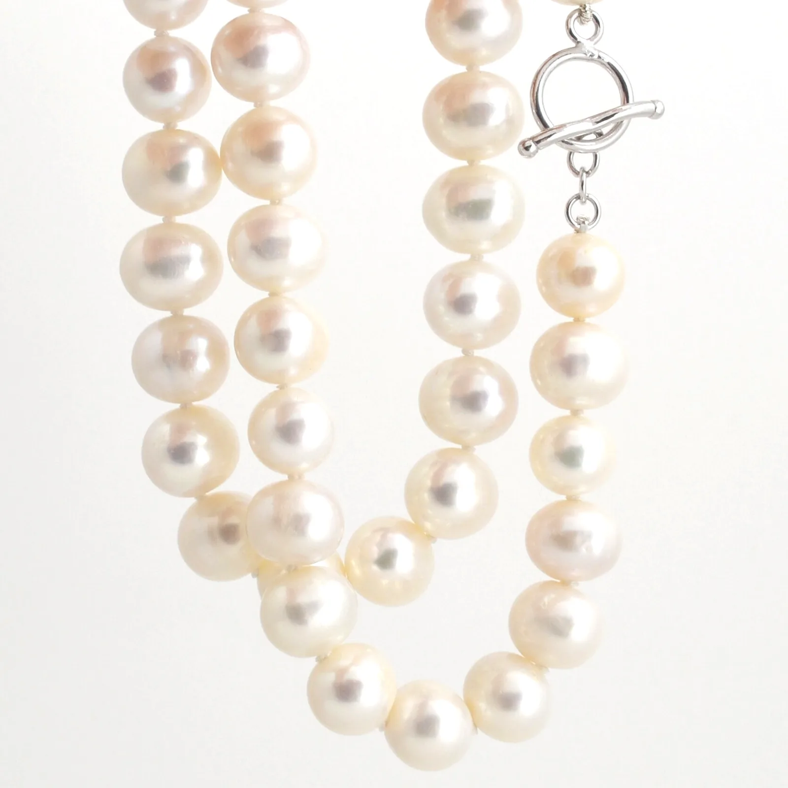 Freshwater White Pearls Round-ish Pearls Fabulous look for little cost! by Sharon Teaman — view 1