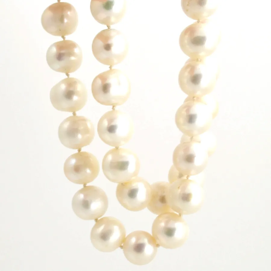 Freshwater White Pearls - Round-ish white - Great look for the Price! by Sharon Teaman