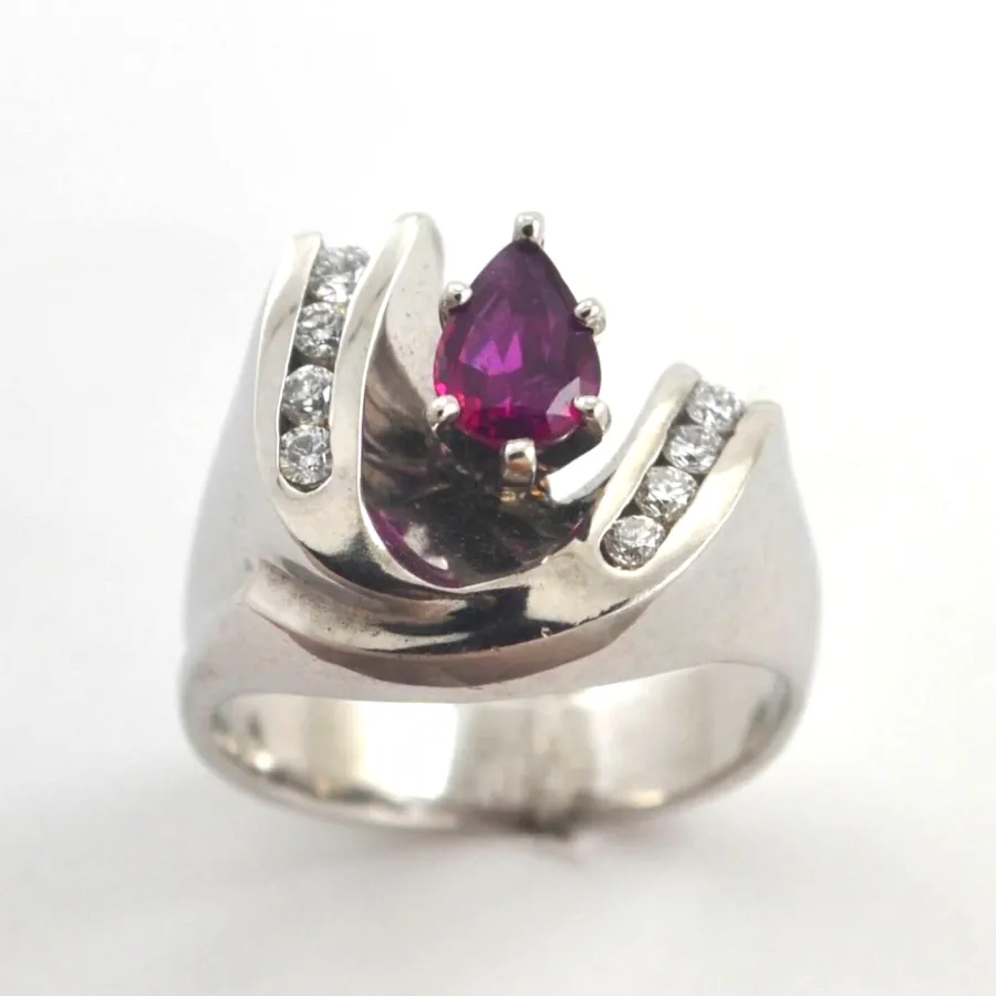 Ruby 240 14K W PEAR cut Ruby with a Double Diamond Arch surrounding this beautiful grem. by Sharon Teaman