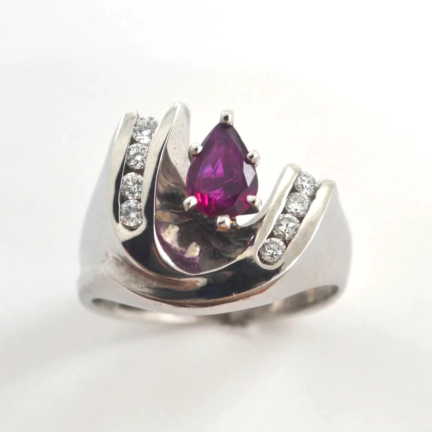 Ruby 240 14K W PEAR cut Ruby with a Double Diamond Arch surrounding this beautiful grem. by Sharon Teaman — view 2