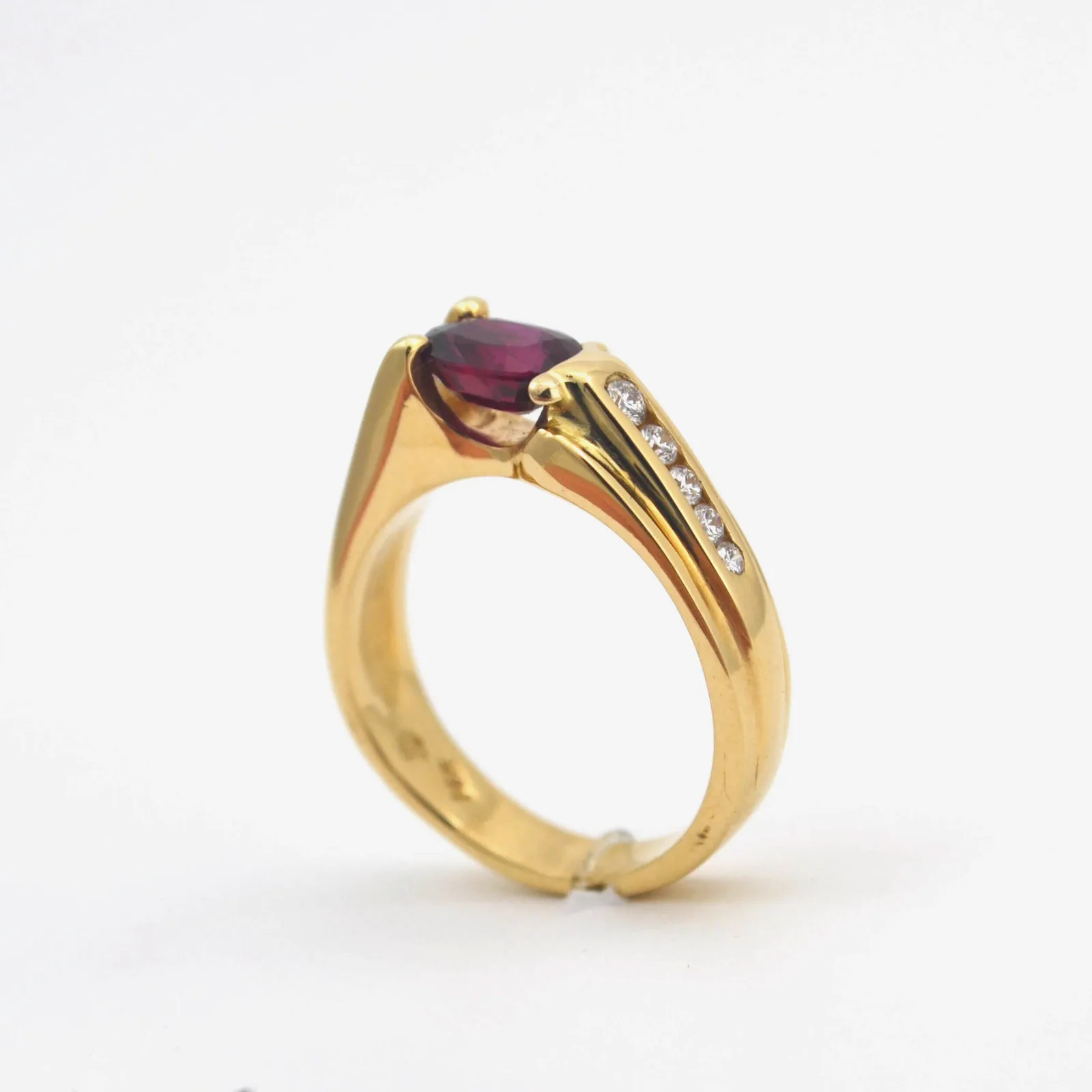 Ruby 484 14K Oval Faceted Ruby (mounted Horizontally) in an artful expression of firey comet. (The 5 channel set Diamonds are earth mined) by Sharon Teaman — view 2